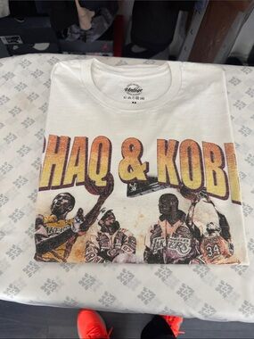 Vintage White Graphic Tee with Yellow & Purple Print